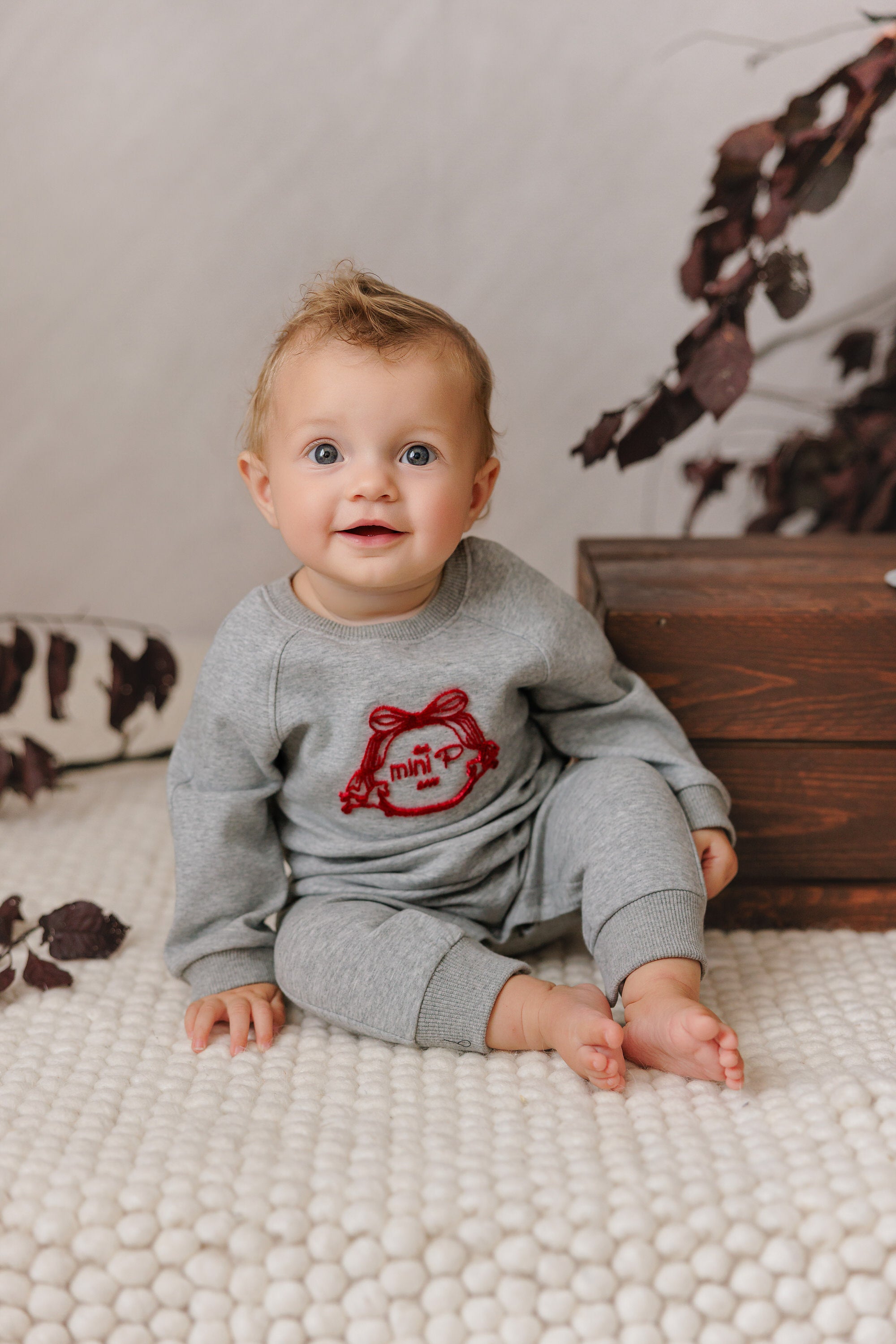 VELVET EMBLEM ONESIE