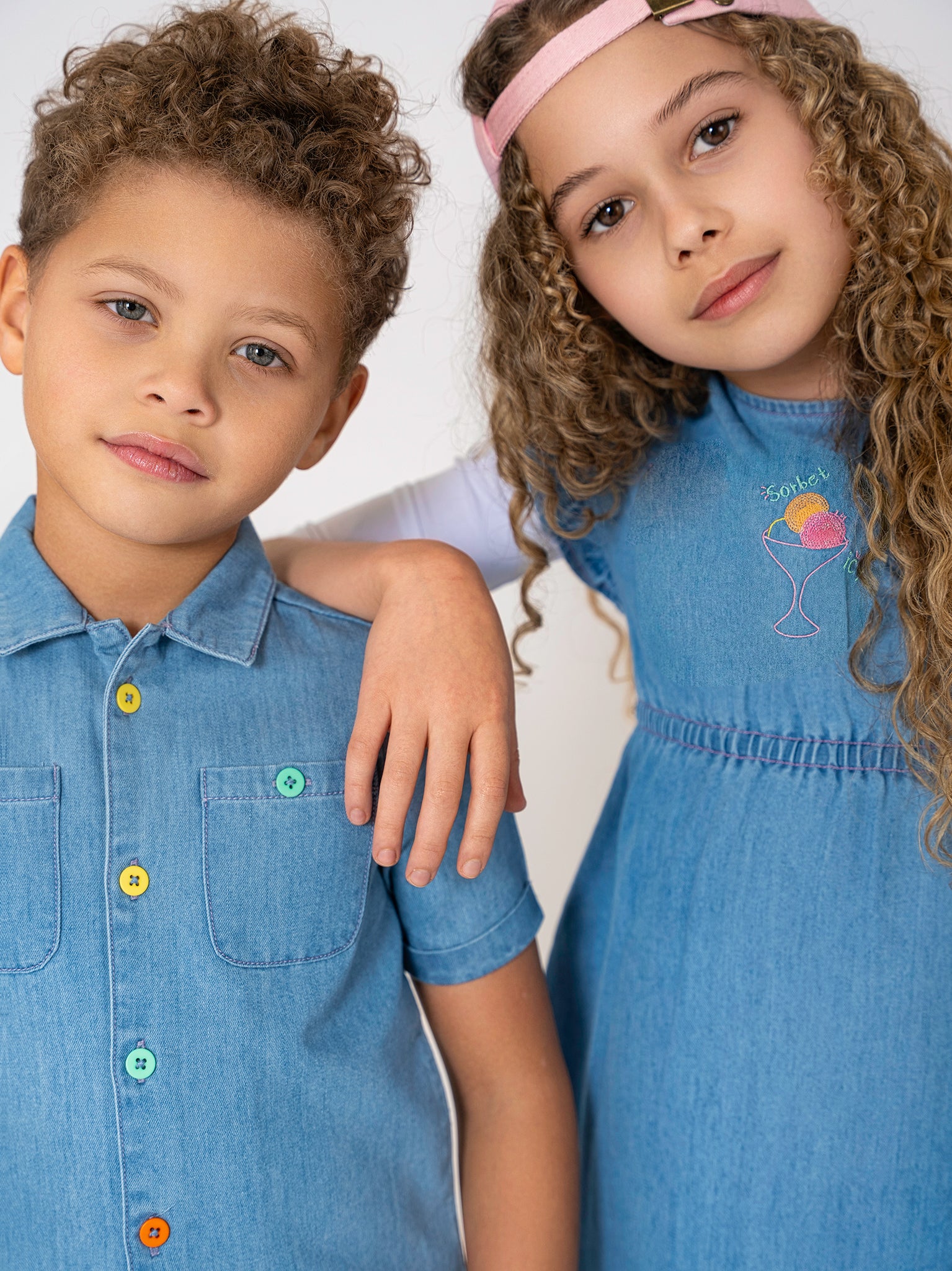 DENIM COLORED BUTTONS ROMPER